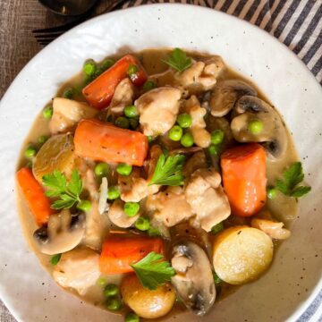 Creamy Chicken Stew in white bowl