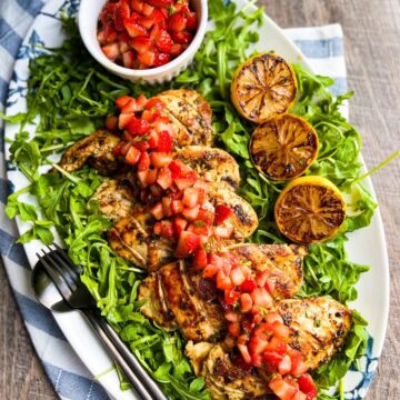 Lemon Basil Chicken with Balsamic Strawberries over arugula