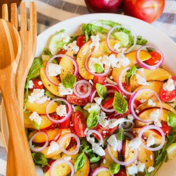 Nectarine & Arugula Salad in big white bowl