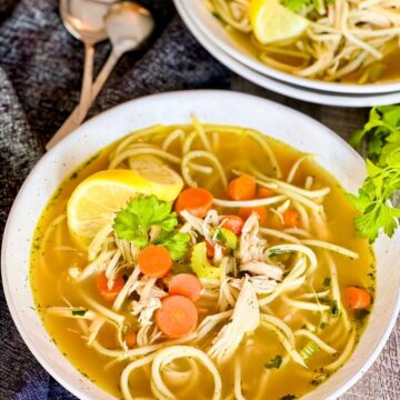 Whole30 Chicken Noodle Soup in white bowls