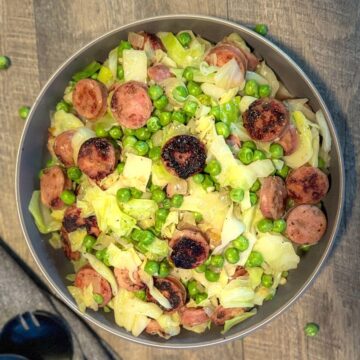 Chicken Sausage and Cabbage in a round grey bowl