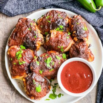 Cherry Jalapeno Chicken on white round plate